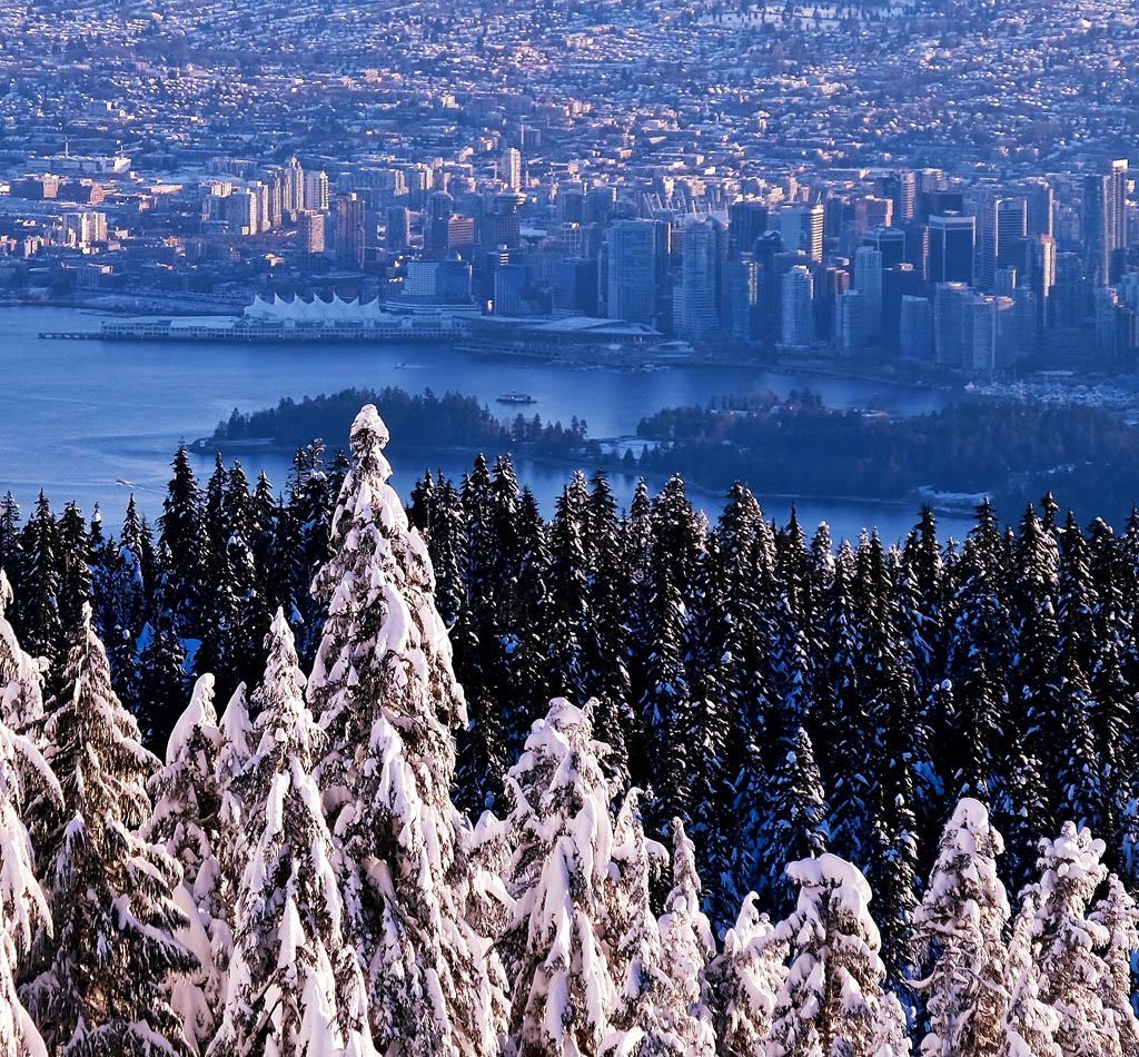 Winter sunset overlooking the city of Vancouver. Cypress Mountain Provincial Park, North Vancouver, British Columbia, Canada.